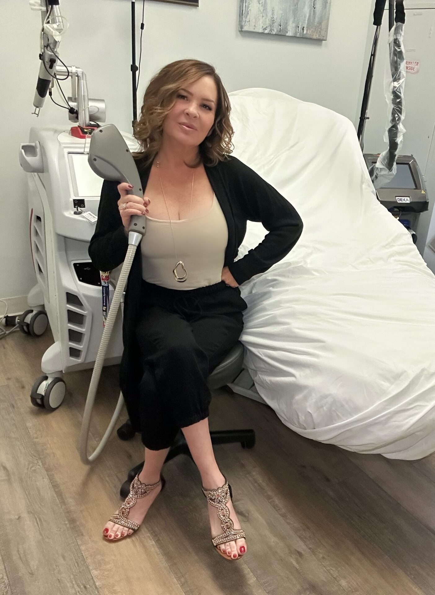 Nurse practitioner performing IPL photofacial at Slender Me Medical in Corona, CA